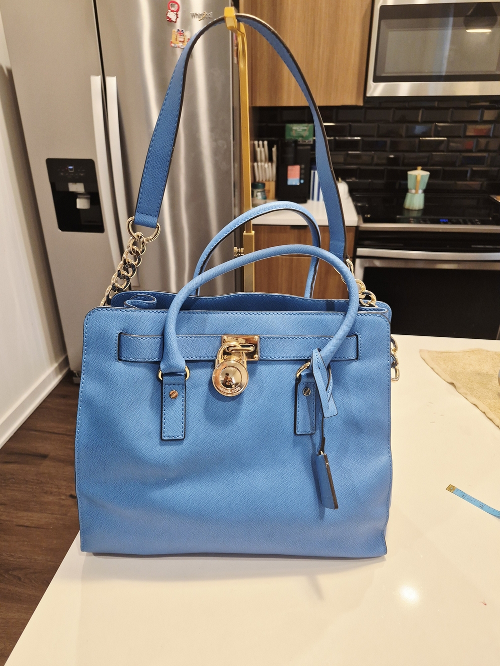 blue Michael Kors Hamilton Saffiano leather tote bag featuring gold-tone hardwar